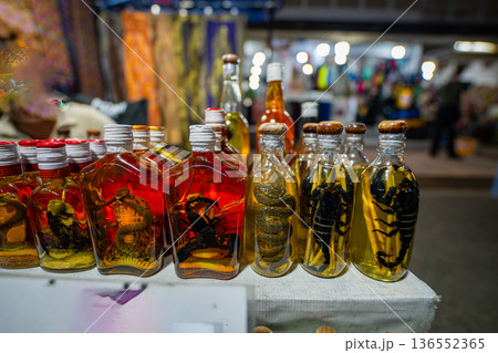 Ancient Lao Beliefs Behind the Potent Snake and Scorpion Liquor 136552365