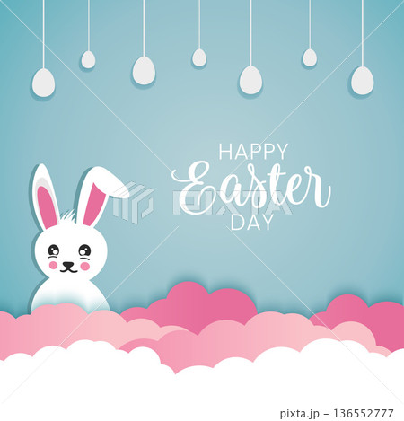Easter greeting in paper cut style featuring a cute white bunny peeking behind pink clouds with hanging eggs on a blue background. Easter greeting in paper cut style featuring a cute white bunny peeking behind pink clouds with hanging eggs on a blue background. 136552777