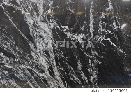 Copacabana black marble texture with expressive white vein patterns and sharp contrast, exotic natural stone from Brazil for wall and floor. Copacabana black marble texture with expressive white vein patterns and sharp contrast, exotic natural stone from Brazil for wall and floor. 136553601