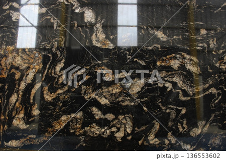Magma Gold marble texture with dramatic gold and cream veins, exotic granite stone from Brazil with intense fire-like patterns. Magma Gold marble texture with dramatic gold and cream veins, exotic granite stone from Brazil with intense fire-like patterns. 136553602