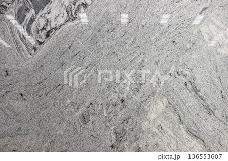 Viscount White granite texture in light grey with fine cross veins, natural stone from India for minimalist and bright room designs. 136553607