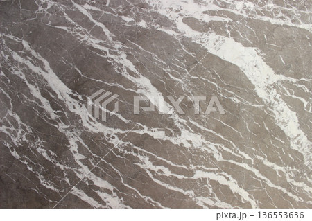 Grigio Billiemi brownish gray marble texture with dense white vein weaving and rich natural stone texture. 136553636