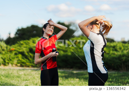 Friends take a break during sports 136556342