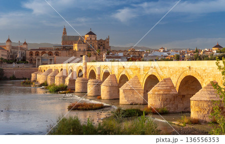 Roman Bridge and Mezquita Cathedral in Cordoba Spain 136556353