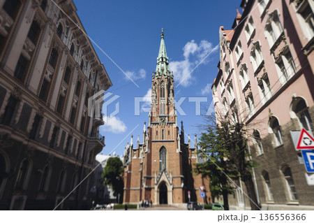 Riga Old Town view, Latvia, streets of Vecriga historical center with Town Hall square, House Of The Black Heads, Cathedral and church, travel to Latvia and Baltic States, summer day with a blue sky Riga Old Town view, Latvia, streets of Vecriga historical center with Town Hall square, House Of The Black Heads, Cathedral and church, travel to Latvia and Baltic States, summer day with a blue sky 136556366