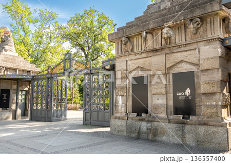 Berlin, germany, august 14, 2023. Berlin zoo main entrance gate showing detailed carvings, ornate metalwork, and the iconic zoo berlin sign on a sunny day Berlin, germany, august 14, 2023. Berlin zoo main entrance gate showing detailed carvings, ornate metalwork, and the iconic zoo berlin sign on a sunny day 136557400