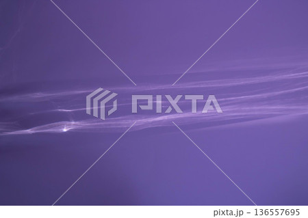 A lilac abstract background with sunlight glaring through the glass. A lilac abstract background with sunlight glaring through the glass. 136557695
