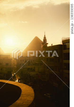 Light Rays Showing The Silhouette Of The Pyramid From The City  136559395