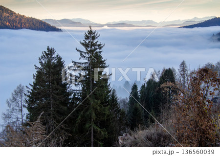 Landscape with sunset above the mountain tops in Austria Landscape with sunset above the mountain tops in Austria 136560039