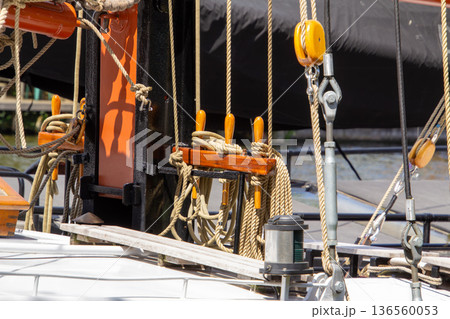 Cable winch of a nautical vessel in the harbor of Muiden Cable winch of a nautical vessel in the harbor of Muiden 136560053