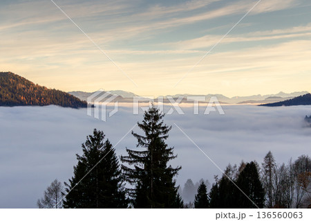 Landscape with sunset above the mountain tops in Austria Landscape with sunset above the mountain tops in Austria 136560063