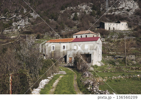 Skadar Lake National park panoramic landscape, Montenegro, Hiking in Skadar Lake, Skadarsko jezero, also called Shkodra or Scutari, with mountains and village in a sunny day, Montenegrin Balkan nature 136560209
