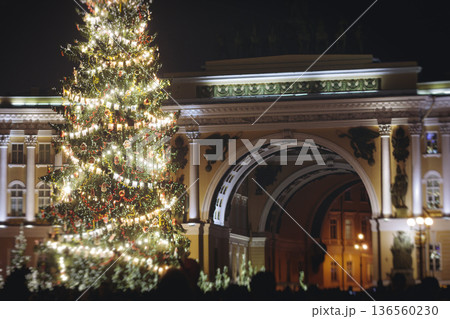 Christmas tree on Palace square, Saint-Petersburg, New Year and Christmas in Russia, glowing decor decoration in a winter snowy street, with night decor illumination, city outdoor lights and garlands Christmas tree on Palace square, Saint-Petersburg, New Year and Christmas in Russia, glowing decor decoration in a winter snowy street, with night decor illumination, city outdoor lights and garlands 136560230
