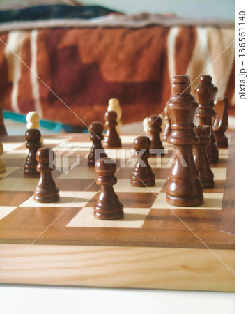 Budapest Family Home Chess Game Final Strategy with Dark Pieces in Focus under Warm Morning Light Interior Lifestyle Photography Hungary Residential Zuglo 136561140
