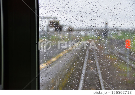 JR北海道函館本線 熱郛駅から長万部駅までの普通列車車窓風景(2023年夏雨) JR北海道函館本線 熱郛駅から長万部駅までの普通列車車窓風景(2023年夏雨) 136562718