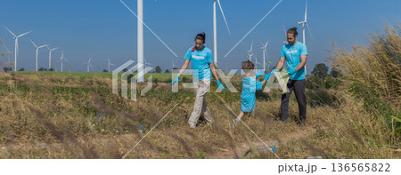 Family collecting garbage at park Family collecting garbage at park 136565822