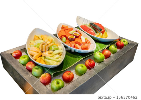 Top view of mixed fruit cut into pieces in the bowl, focus selective Top view of mixed fruit cut into pieces in the bowl, focus selective 136570462