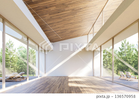 Modern minimalist empty room with floor to ceiling glass windows overlooking a lush pine forest 3d render 136570958