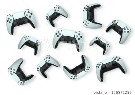 Wireless gaming controllers flying in air isolated on white background, symbolizing gaming technology concept Wireless gaming controllers flying in air isolated on white background, symbolizing gaming technology concept 136571255