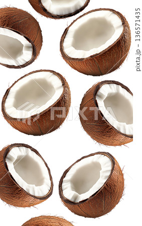 Halved ripe coconuts with fibrous brown shells and white meat, isolated on white background, concept of tropical fruits 136571435