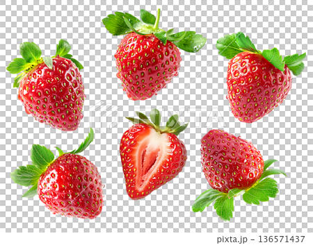 Juicy whole and halved strawberries with green leaves scattered and isolated on white background, freshness and healthy eating Juicy whole and halved strawberries with green leaves scattered and isolated on white background, freshness and healthy eating 136571437