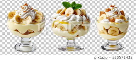 Banana pudding dessert with whipped cream and mint leaves in glass cup, isolated on white background, concept of sweet treat Banana pudding dessert with whipped cream and mint leaves in glass cup, isolated on white background, concept of sweet treat 136571438