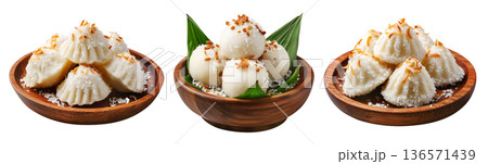 Banana coconut rice dumplings topped with toasted almonds, isolated on white background, concept of Micronesia Asian dessert Banana coconut rice dumplings topped with toasted almonds, isolated on white background, concept of Micronesia Asian dessert 136571439