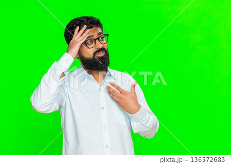 Indian man facepalm gesture slapping forehead with hand shows regret frustration mistake realization 136572683