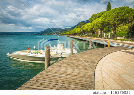 Waterfront pedestrian walkway and Lake Garda, Toscolano Maderno, Lombardy, Italy 136576023