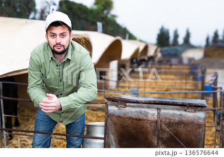 Portrait of farmer standing outdoors Portrait of farmer standing outdoors 136576644