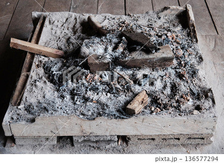 A bonfire is fire in a wooden container for cooking in countryside of Thailand A bonfire is fire in a wooden container for cooking in countryside of Thailand 136577294