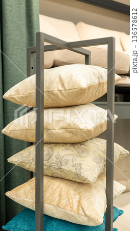 Stack of patterned decorative pillows in modern interior design display Stack of patterned decorative pillows in modern interior design display 136578612