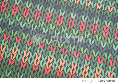 Vibrant abstract leaf pattern with green and red motif on dark background Vibrant abstract leaf pattern with green and red motif on dark background 136578646