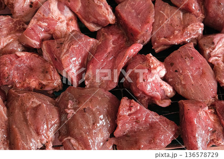 Raw sliced pork in sauce. Pieces of fresh marinated pork medallions. Freshly meat tenderloin, perfect for culinary, home cooked meals and flavor. Chopped Pork ham fillet with spice, herbs. 4K video Raw sliced pork in sauce. Pieces of fresh marinated pork medallions. Freshly meat tenderloin, perfect for culinary, home cooked meals and flavor. Chopped Pork ham fillet with spice, herbs. 4K video 136578729