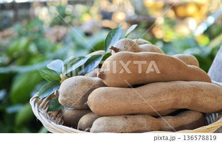 Sweet tamarind in the basket Sweet tamarind in the basket 136578819
