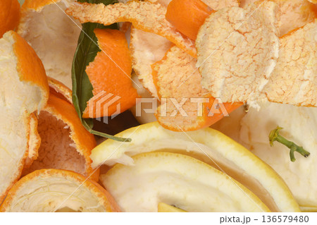 Citrus fruit peels background 136579480