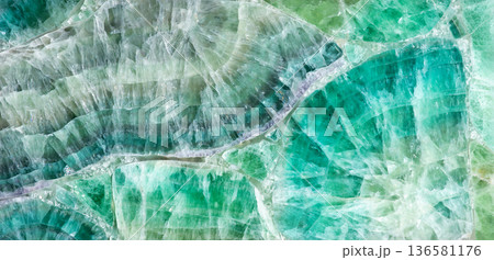 Green Fluorite stone background, natural texture in fresh color as part of your interior work. 136581176