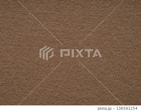 Dark beige blank felt texture closeup. Full frame retro, vintage pattern. Top view, layout, place for text. Textured pattern for shops with goods, creativity to illustrate patchwork master classes. 136581254