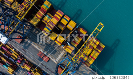 Aerial view Container cargo ship loading unloading container import export sea port, Global trade business container cargo ship freight shipping commercial trade logistic transportation international. 136583845
