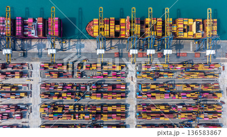 Aerial view Container cargo ship loading unloading container import export sea port, Global trade business container cargo ship freight shipping commercial trade logistic transportation international. Aerial view Container cargo ship loading unloading container import export sea port, Global trade business container cargo ship freight shipping commercial trade logistic transportation international. 136583867