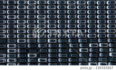 Aerial view car for sale stock lot row, Cars dealership inventory distribution automobile and automotive business, New cars parking for sale automobile automotive industry business. 136583887