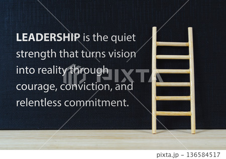 LEADERSHIP concept with endless commitment text on black cover background. LEADERSHIP concept with endless commitment text on black cover background. 136584517