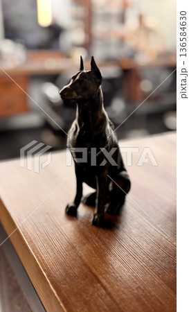 A meticulously crafted and elegantly designed bronze figurine of a Doberman, ideal for dog enthusiasts and home decor A meticulously crafted and elegantly designed bronze figurine of a Doberman, ideal for dog enthusiasts and home decor 136584630