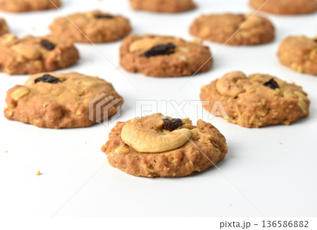 Cashews and Raisins cookies on a white background Cashews and Raisins cookies on a white background 136586882