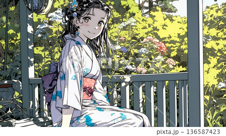 浴衣姿で夕涼みをしている若い女性