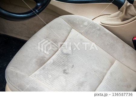 Close-up of a Dirty and Stained Car Seat Interior Close-up of a Dirty and Stained Car Seat Interior 136587736