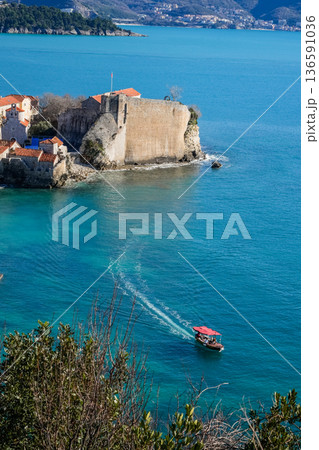 Top View of Boat Floating Near Budva Old Town Top View of Boat Floating Near Budva Old Town 136591036