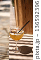 Summer cocktail photographed in between shadows and lights 136592396