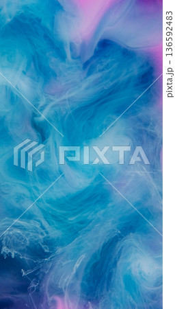 Ink drop splash. Smog water texture. Defocused blue pink purple color bright liquid acrylic pigment cloud fog on abstract background. 136592483