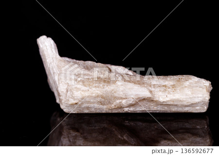 Macro mineral stone Orthoclase on black background 136592677
